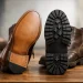 Bota com solado de couro ou borracha?